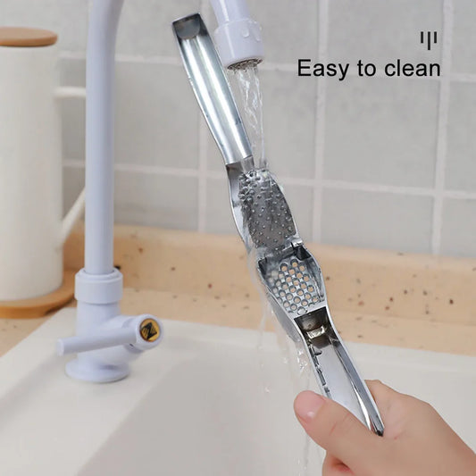 Ergonomic Garlic Press - Handheld Masher for Effortless Garlic and Ginger Crushing