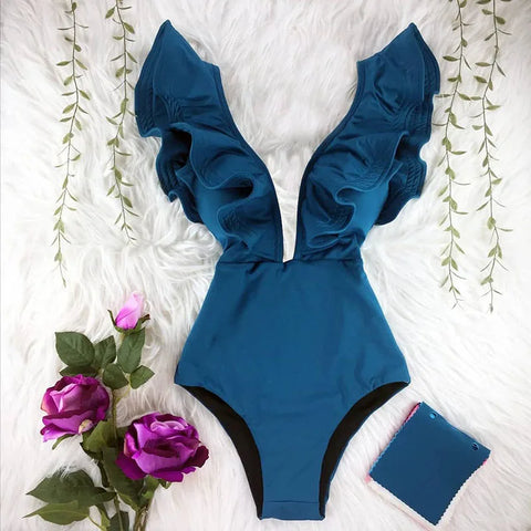 Badpak met ruches en diepe V-hals – monokini met bloemenprint en push-up-effect voor dames