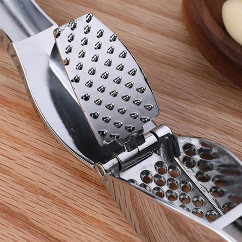 Ergonomic Garlic Press - Handheld Masher for Effortless Garlic and Ginger Crushing