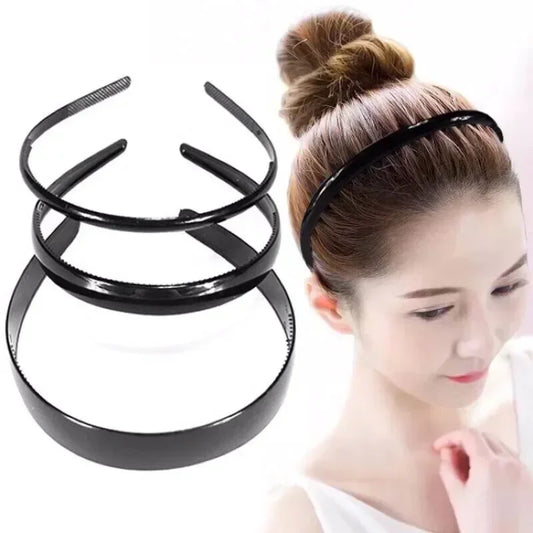 Zwarte modieuze golvende unisex haarband van kunststofhars - sportief haaraccessoire 
