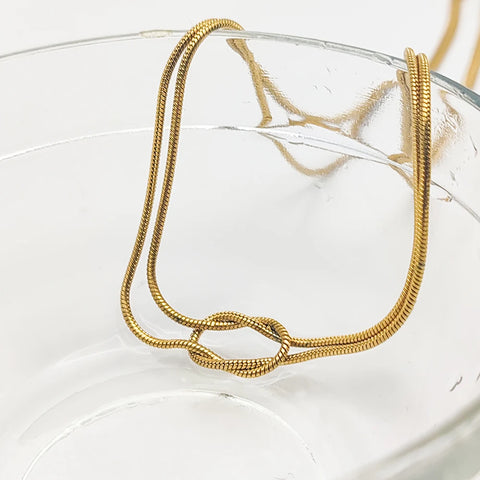 eManco Elegant Minimalist Jewelry: 14k Gold Plated Knotted Snake Chain Necklace for Women