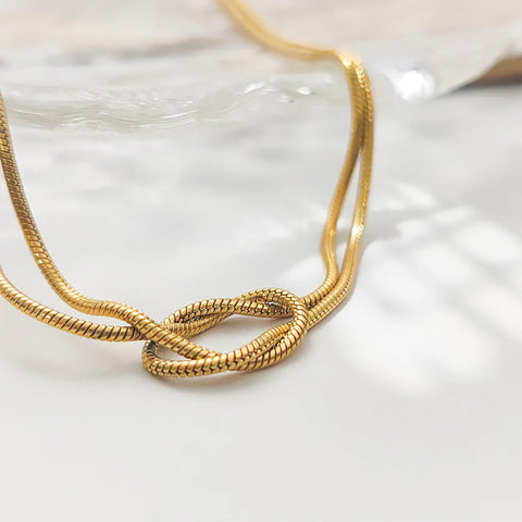 eManco Elegant Minimalist Jewelry: 14k Gold Plated Knotted Snake Chain Necklace for Women