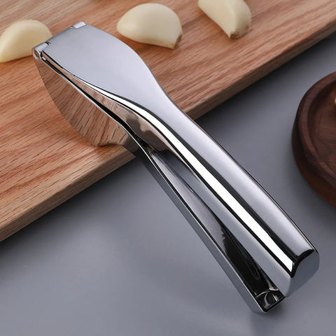 Ergonomic Garlic Press - Handheld Masher for Effortless Garlic and Ginger Crushing