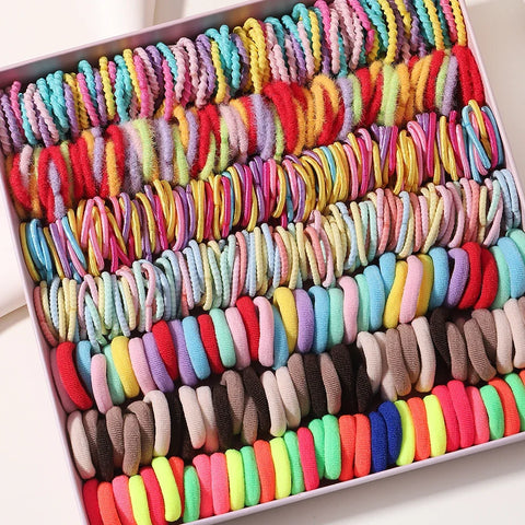 Set van 100 kleurrijke haarbanden voor meisjes - Nylon elastische rubberen bandjes paardenstaarthouders voor kinderen 