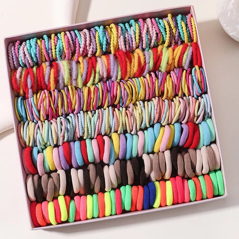 Set van 100 kleurrijke haarbanden voor meisjes - Nylon elastische rubberen bandjes paardenstaarthouders voor kinderen 