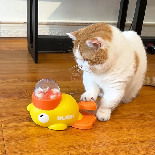 Gele eendvormige interactieve kattensnoepjesdispenser