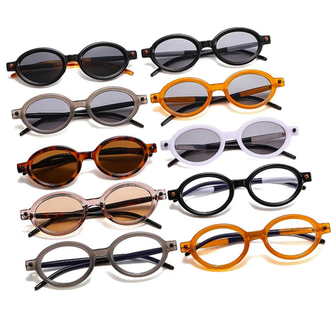 SHAUNA Kleine ovale retro zonnebril - heldere oceaankleurige lens UV400 unisex punk klinknagel zonnebril