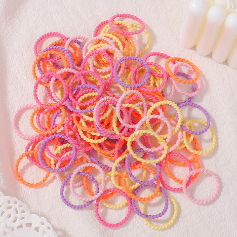 Set van 100 kleurrijke haarbanden voor meisjes - Nylon elastische rubberen bandjes paardenstaarthouders voor kinderen 