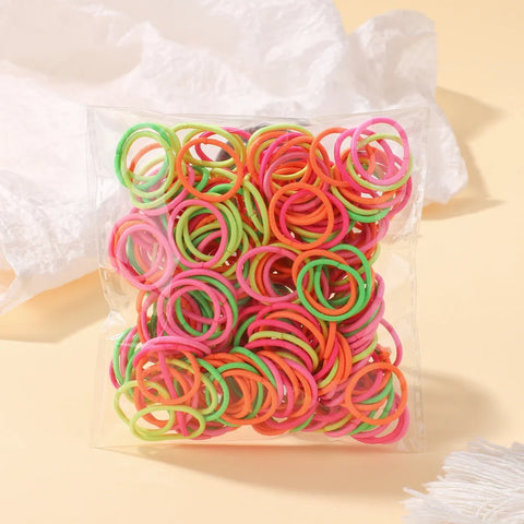 Set van 100 kleurrijke haarbanden voor meisjes - Nylon elastische rubberen bandjes paardenstaarthouders voor kinderen 