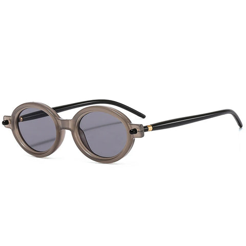 SHAUNA Kleine ovale retro zonnebril - heldere oceaankleurige lens UV400 unisex punk klinknagel zonnebril