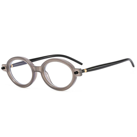 SHAUNA Kleine ovale retro zonnebril - heldere oceaankleurige lens UV400 unisex punk klinknagel zonnebril
